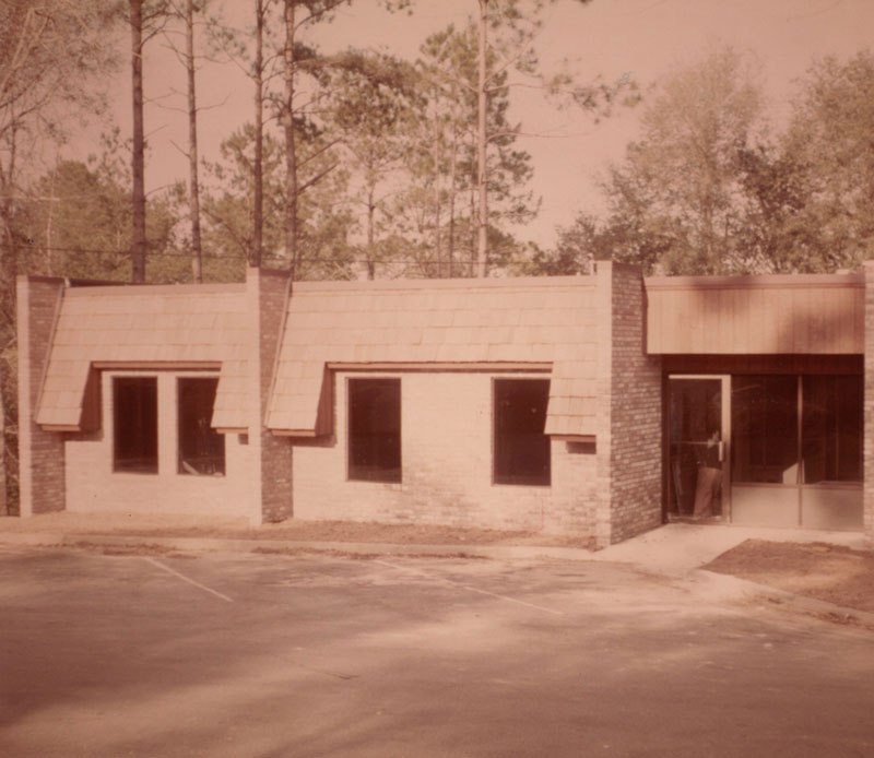 sepia toned photo of the front of the Cook Dental Clinic